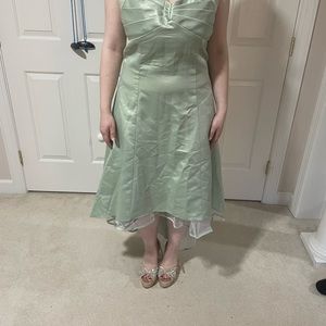 Sage green short dress with longer back
